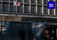 China and Japan flags displayed during rising diplomatic tensions over China export controls on Japanese entities