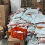 Seized packaged food items linked to the expired food relabelling racket in Delhi