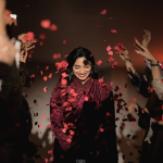 Kerala minimal bridal look featuring a wine-red saree without jewellery